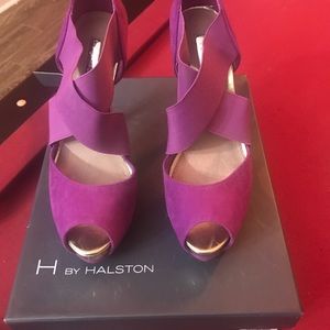 Magenta colored pumps